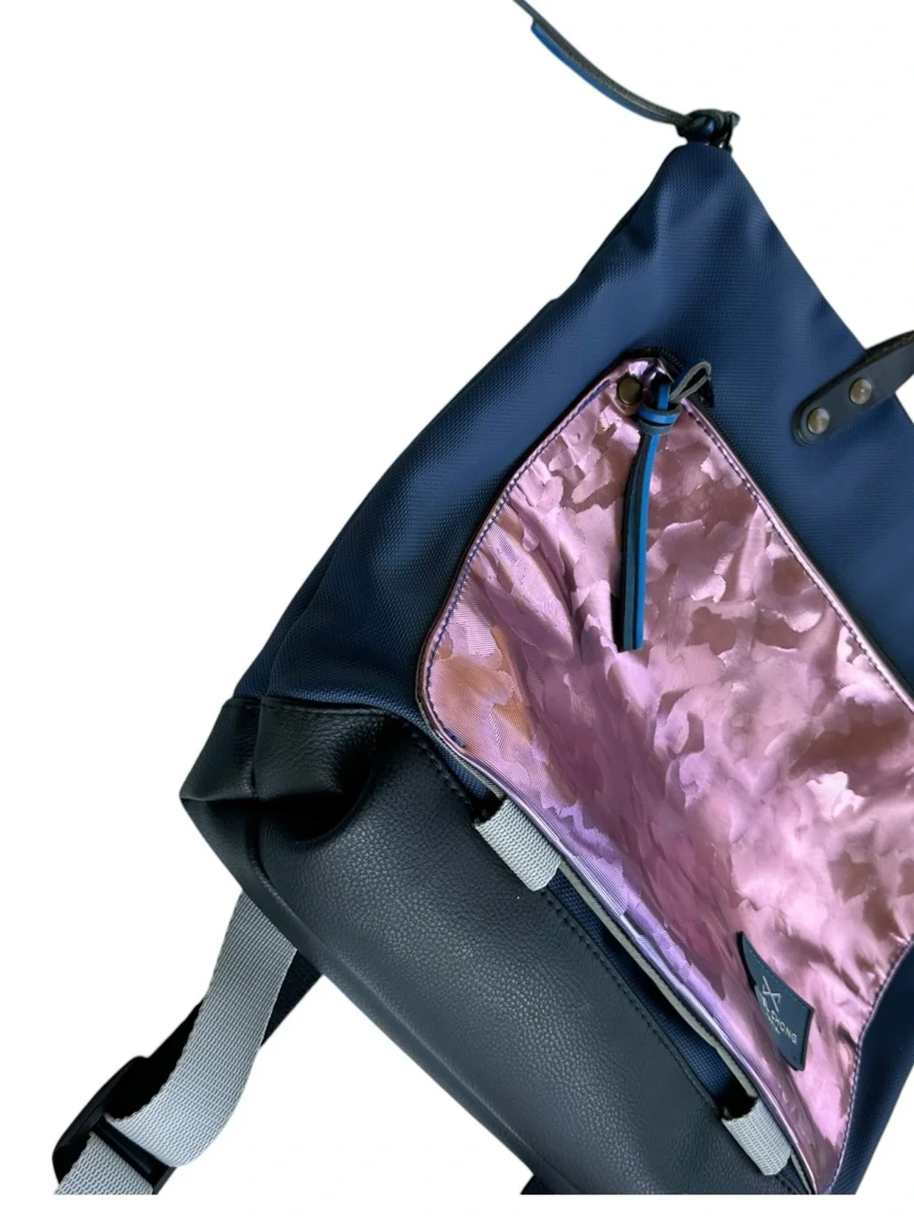 Daniel Chong Madrid • Waterproof Book Holder Backpack Metallic Rose/Navy
